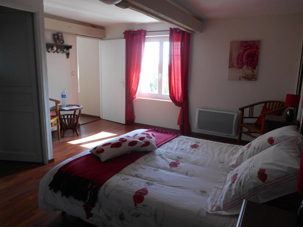 Postel nebo postele na pokoji v ubytování Le Pressoir B&B