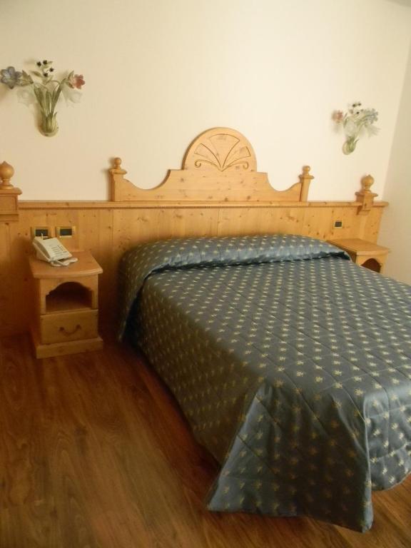 Postel nebo postele na pokoji v ubytování Hotel Mountain Resort