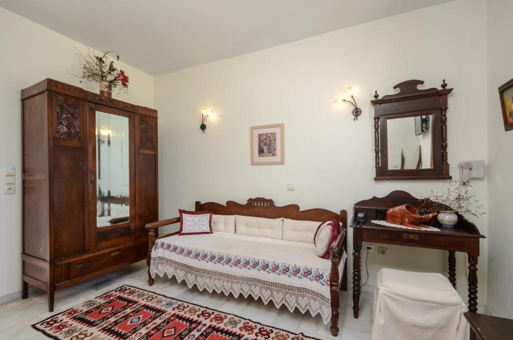 Postel nebo postele na pokoji v ubytování Chateau Zevgoli