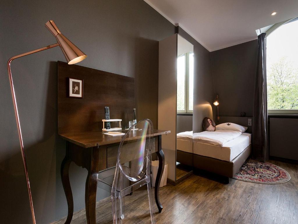 Postel nebo postele na pokoji v ubytování Hotel Heimathafen
