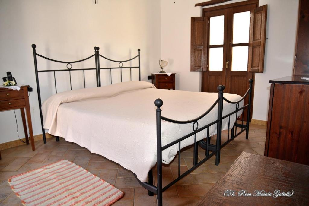 Postel nebo postele na pokoji v ubytování Antico Borgo