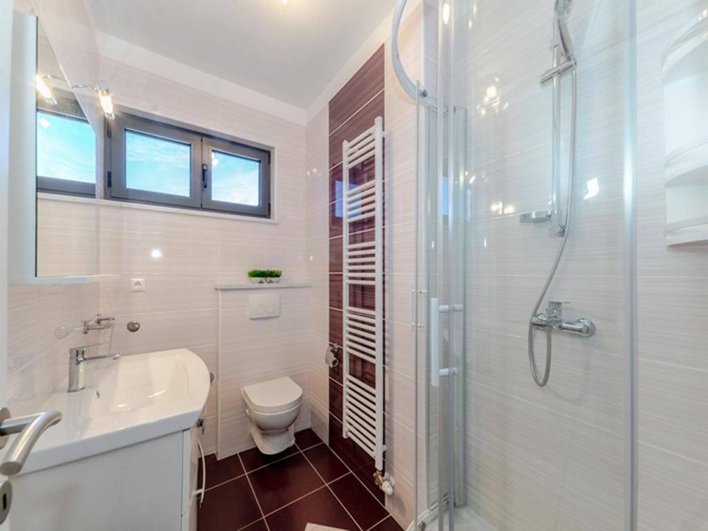 Koupelna v ubytování Apartments Dalmatia
