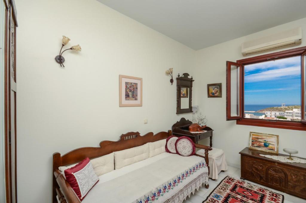 Postel nebo postele na pokoji v ubytování Chateau Zevgoli