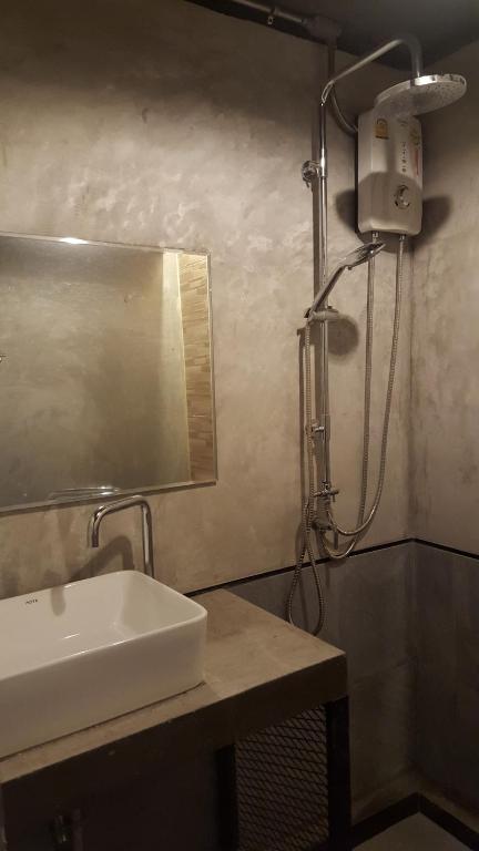 Koupelna v ubytování I-Talay Loft