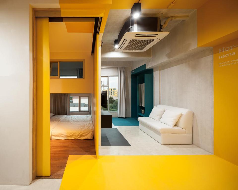 Postel nebo postele na pokoji v ubytování BoB Hostel บ็อบโฮสเทล