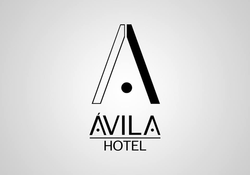 a logo for a hotel in black and white at Avila Hotel in Boa Esperança