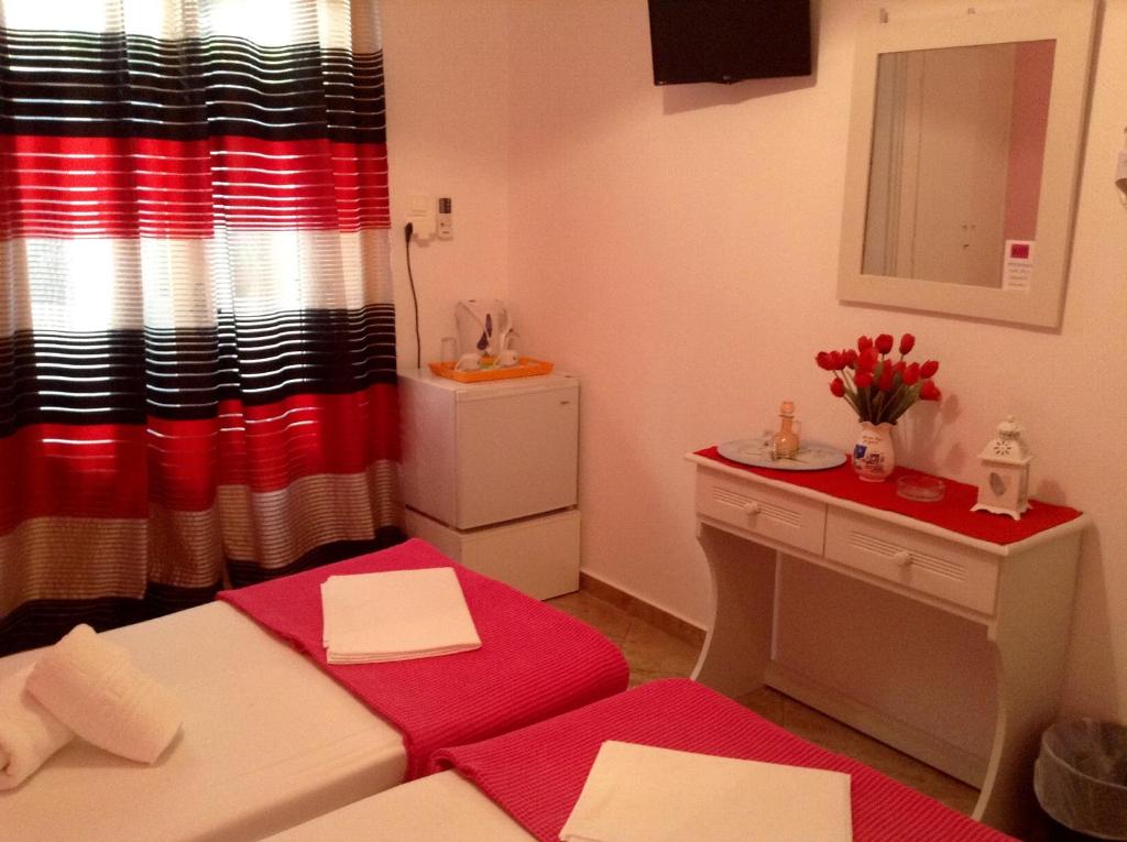 Posteľ alebo postele v izbe v ubytovaní Nikoletta Rooms