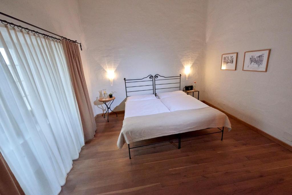Postel nebo postele na pokoji v ubytování Hotel Restaurant Rathaus