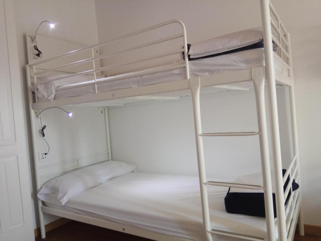 A bed or beds in a room at Cruces de Iria