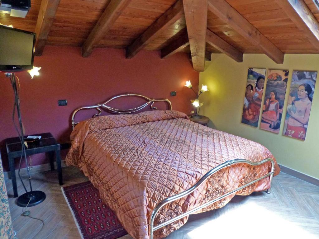 Posteľ alebo postele v izbe v ubytovaní Villa Morelli Gualtierotti