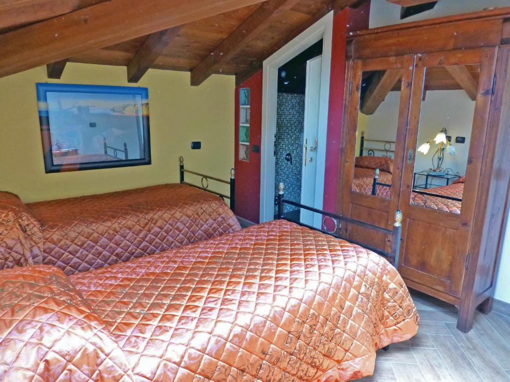 Posteľ alebo postele v izbe v ubytovaní Villa Morelli Gualtierotti