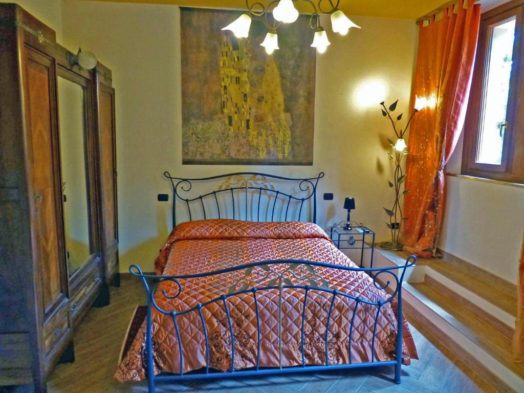 Posteľ alebo postele v izbe v ubytovaní Villa Morelli Gualtierotti