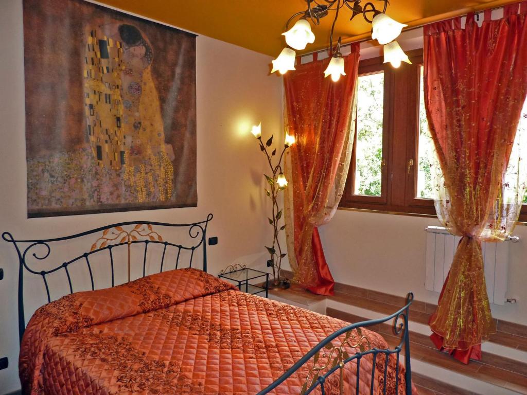 Posteľ alebo postele v izbe v ubytovaní Villa Morelli Gualtierotti