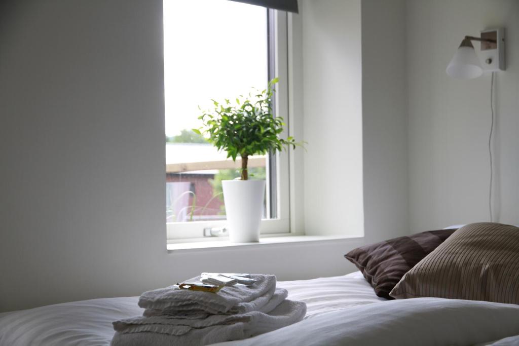 Postel nebo postele na pokoji v ubytování Flygplatshotellet