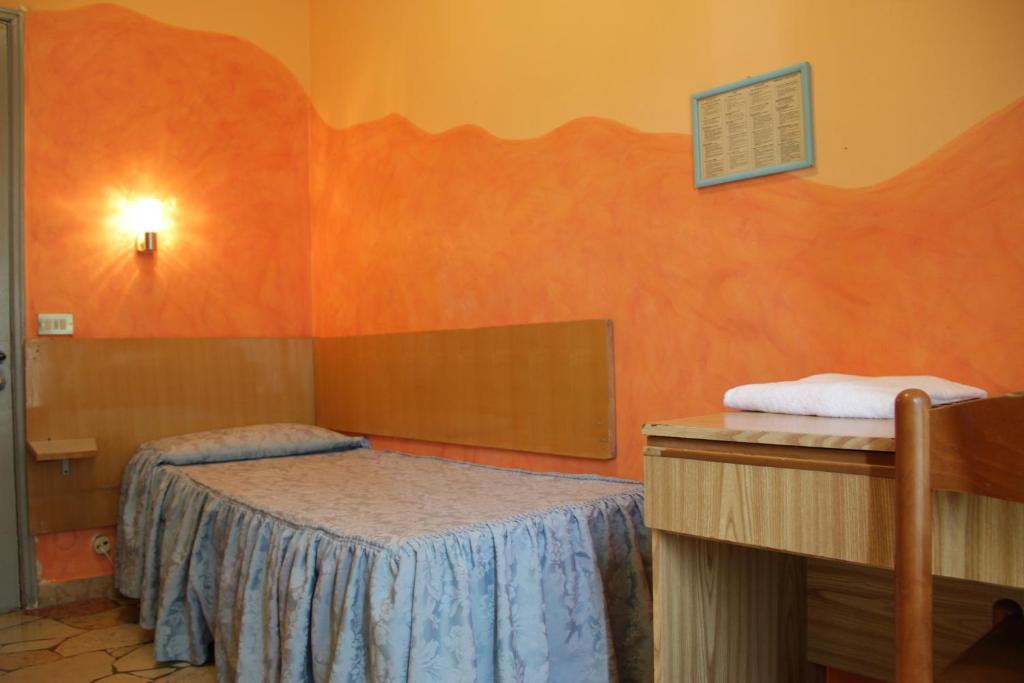 Postel nebo postele na pokoji v ubytování Hotel Del Sud