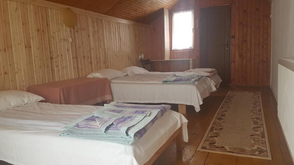 Postel nebo postele na pokoji v ubytování Pension Zamolxe