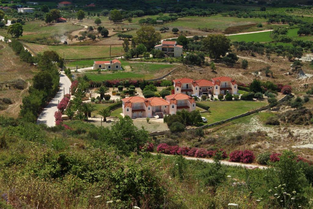 arial view of a house on a hill at Gouna's Aparts in Xi