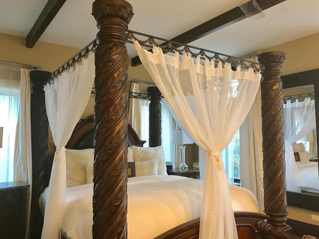 Postel nebo postele na pokoji v ubytování Villa D' Citta