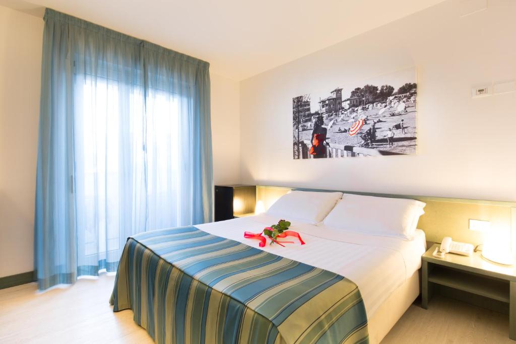 Posteľ alebo postele v izbe v ubytovaní Hotel Florida
