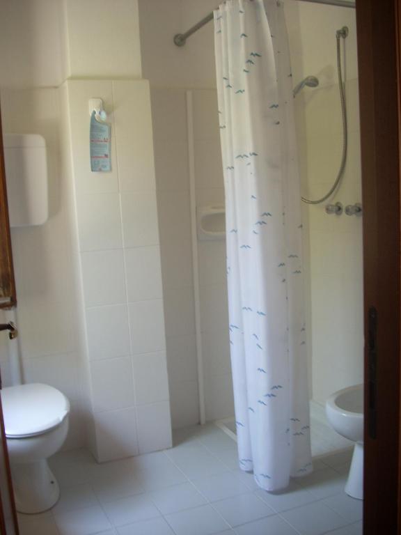 Koupelna v ubytování Hotel Corallo