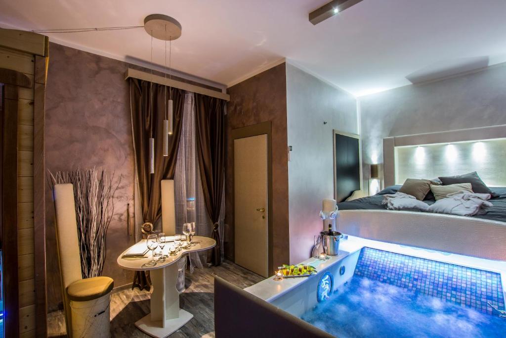 A bed or beds in a room at Roma d'Amore