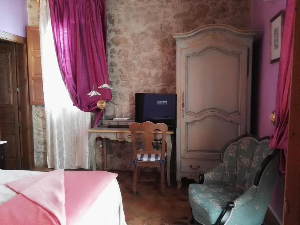 TV a/nebo společenská místnost v ubytování Hotel Boutique Bodegas De Arnes - Adults Only
