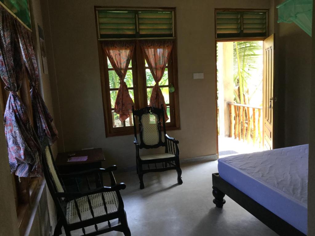 Postel nebo postele na pokoji v ubytování Tranquality Chalets