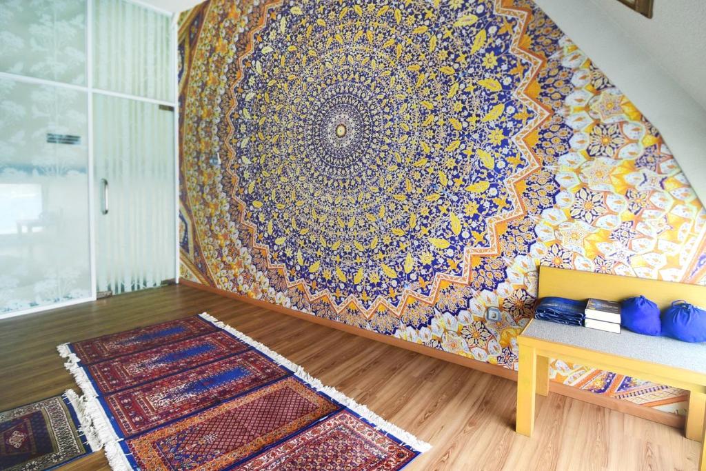 Postel nebo postele na pokoji v ubytování Rhadana Hotel