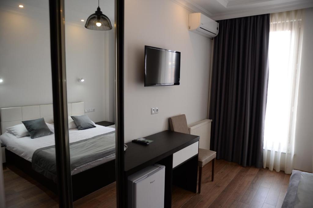 Postel nebo postele na pokoji v ubytování Guest House Gantiadi