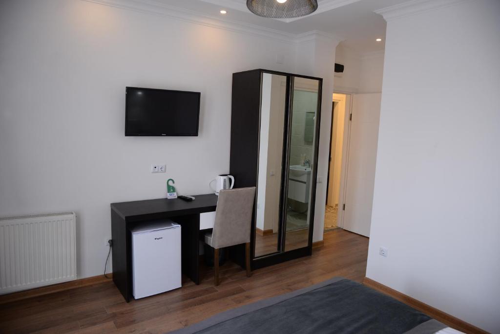TV a/nebo společenská místnost v ubytování Guest House Gantiadi