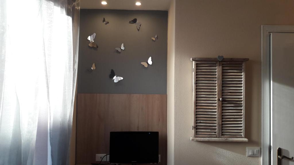 TV a/nebo společenská místnost v ubytování Hotel Mariani