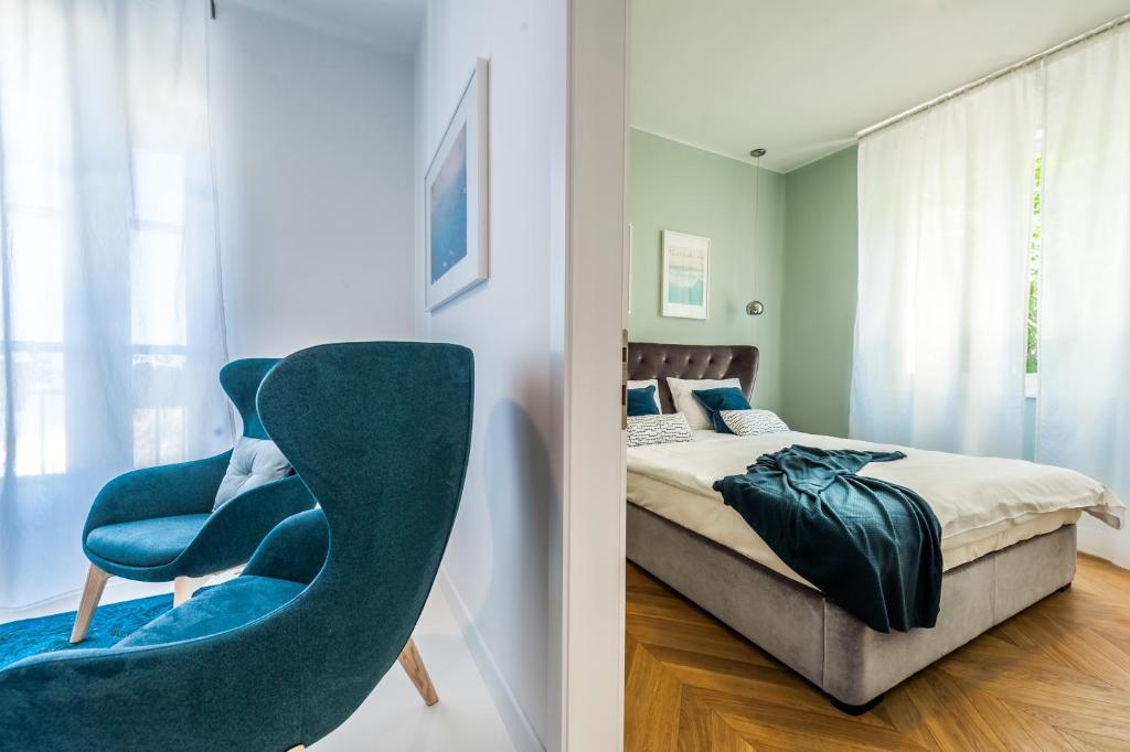 Postel nebo postele na pokoji v ubytování Aquamarine Sea View Apartment