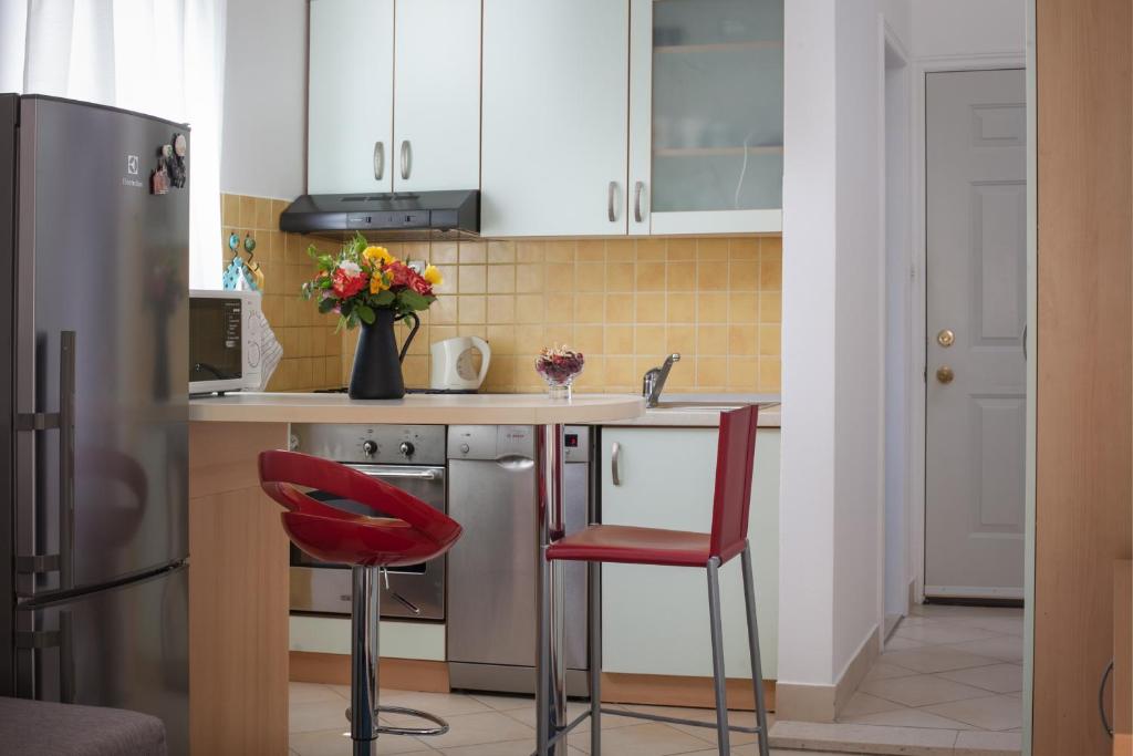Kuchyň nebo kuchyňský kout v ubytování Apartments Ivandić