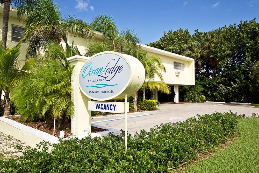 a sign for the front of a building at Ocean Lodge in Boca Raton