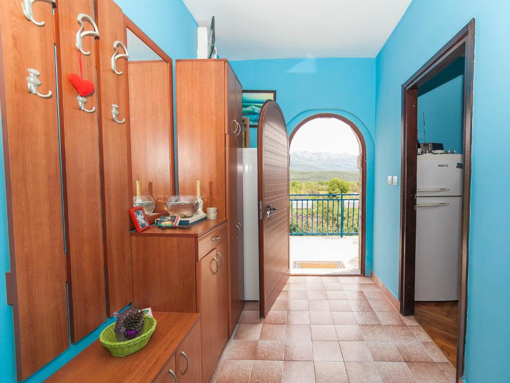 Kuchyň nebo kuchyňský kout v ubytování Holiday House Stari Volat