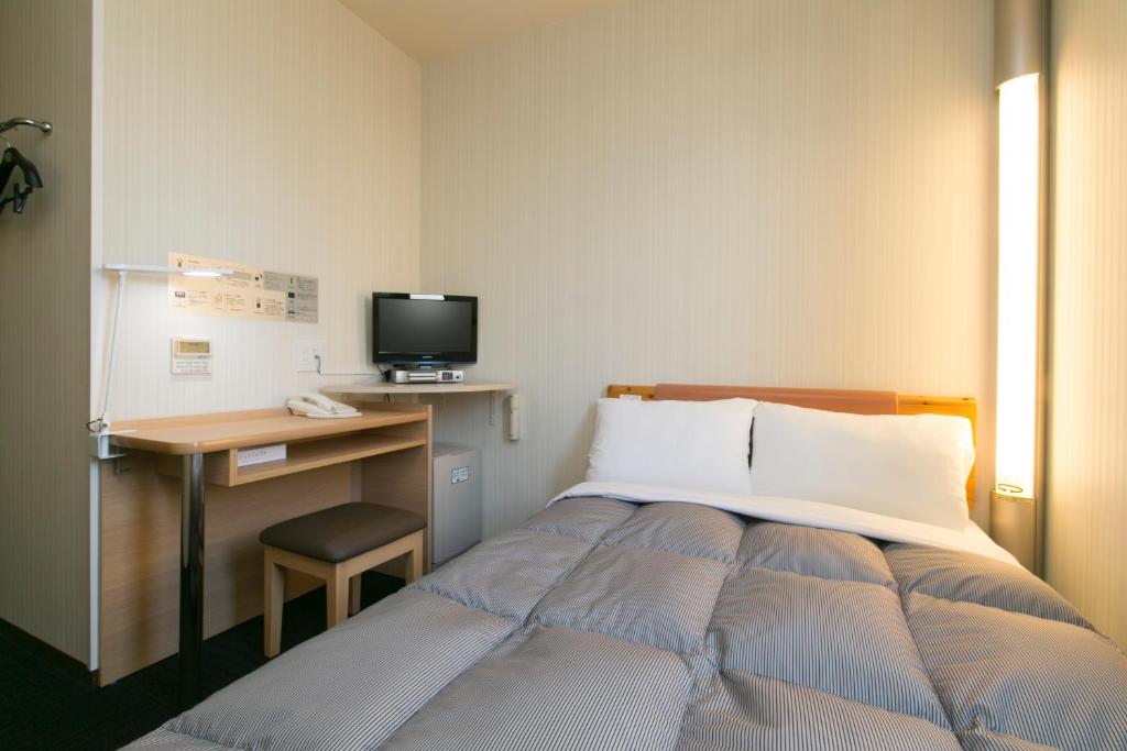 Llit o llits en una habitació de WASHINGTON R&B Hotel Nagoya Nishiki