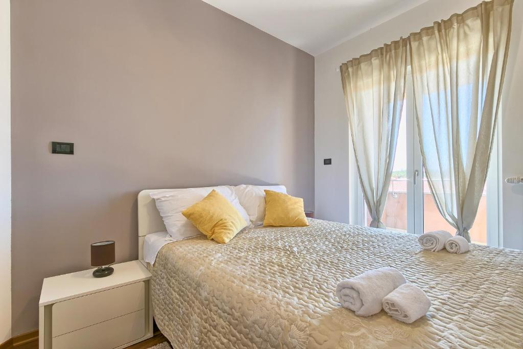 Posteľ alebo postele v izbe v ubytovaní Adriatic Apartments