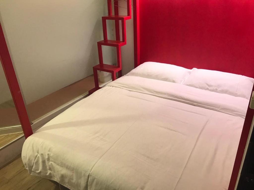 Postel nebo postele na pokoji v ubytování SleepBox Hostel
