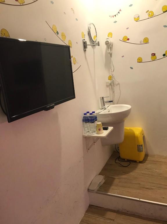 Koupelna v ubytování SleepBox Hostel