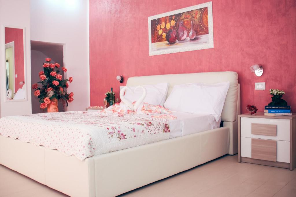 Postel nebo postele na pokoji v ubytování Il Sorriso B&B