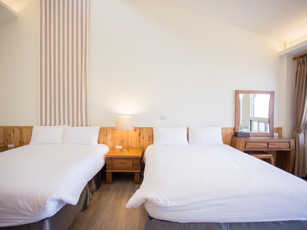 Voodi või voodid majutusasutuse Cloud Villa toas