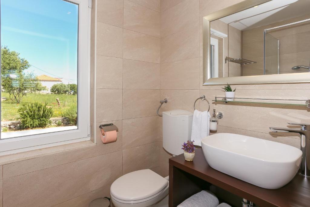 Kúpeľňa v ubytovaní Holiday home Trogir flower