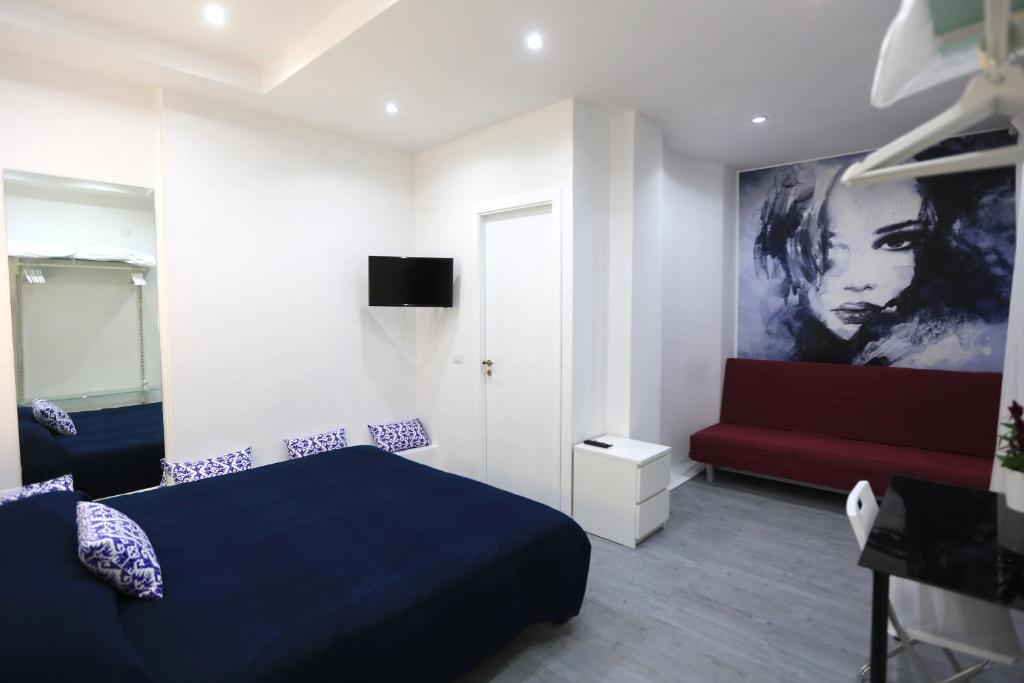 A bed or beds in a room at Cico B&B