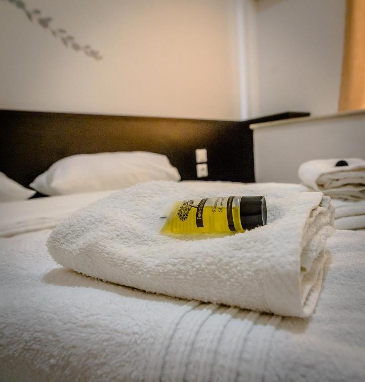 Postel nebo postele na pokoji v ubytování Galanopoulos Hotel