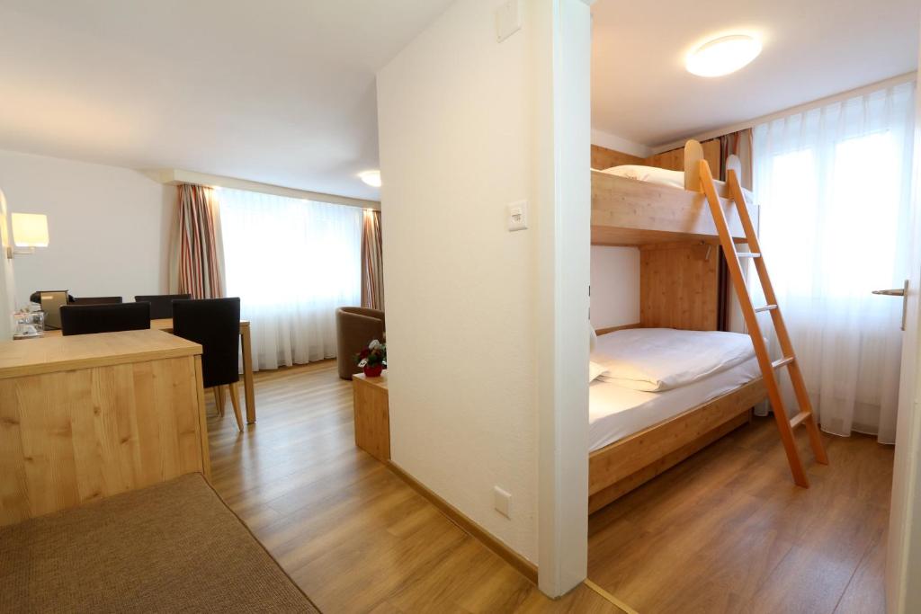 Postel nebo postele na pokoji v ubytování Lifestyle & Spa Hotel Grächerhof