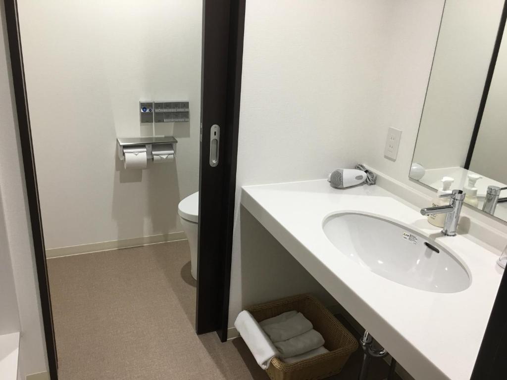 Koupelna v ubytování Hotel Showmeikan