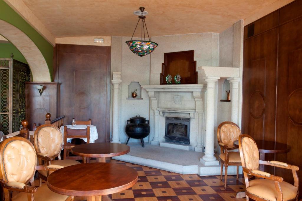 Posedenie v ubytovaní Hotel Os Olivos
