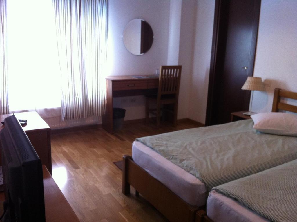 Postel nebo postele na pokoji v ubytování Casa Pescarilor