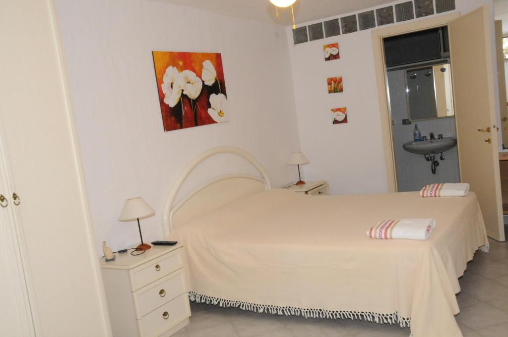 Katil atau katil-katil dalam bilik di B&B Casa Derosas