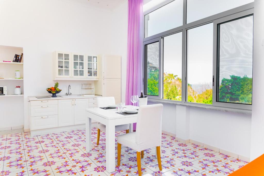 Kuchyň nebo kuchyňský kout v ubytování Artis Domus Relais & Spa